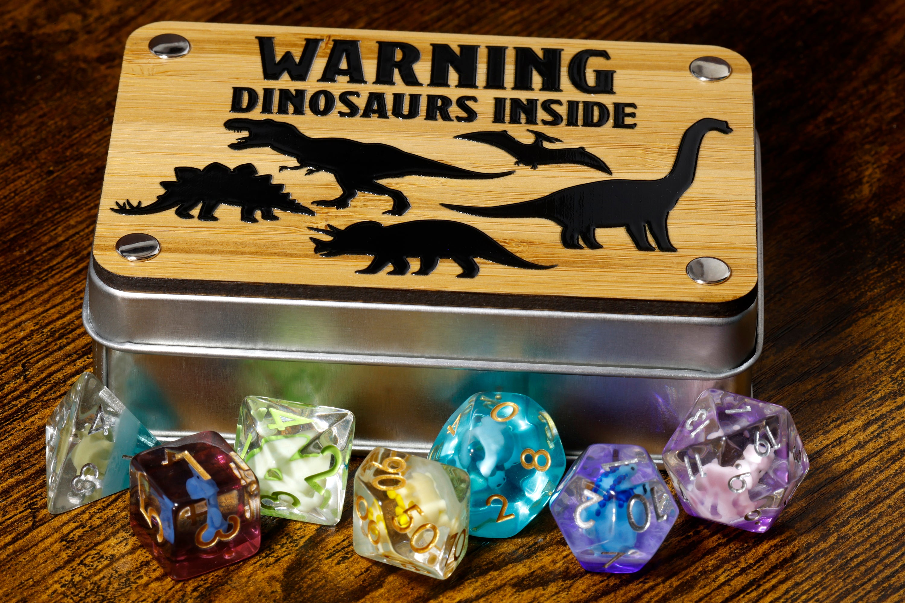 a tin with a dinosaur inside of it on a table