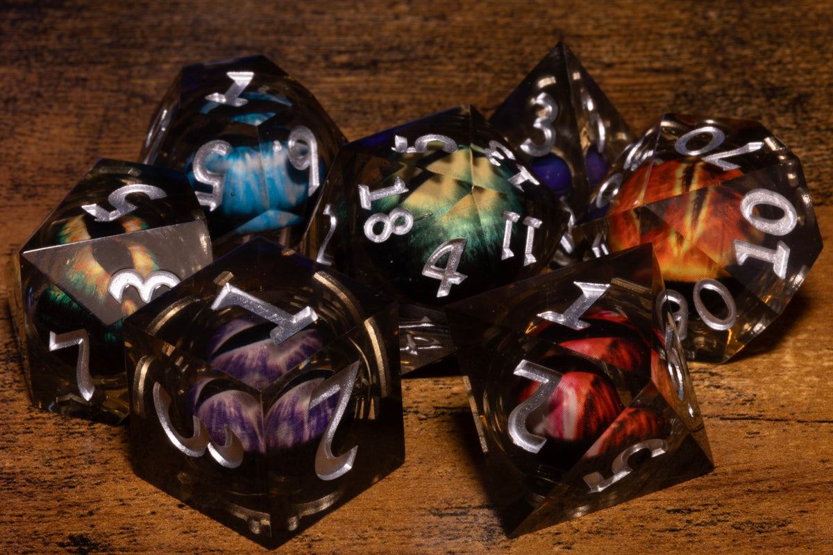 Council of Wyrms 7-Piece Liquid Core Dice Set – Sharp Edge with Mixed Dragon Eyes