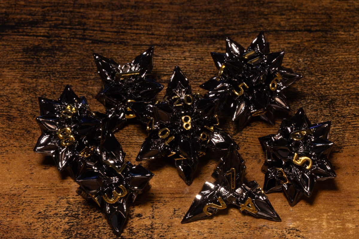 Blooming Stars 7-Piece Metal Dice Set – Gunmetal with Gold Numbers