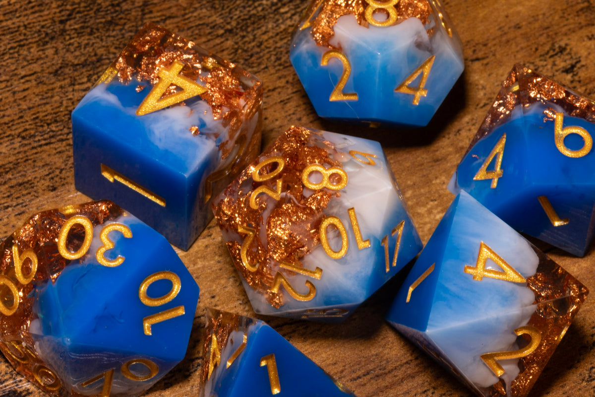 Sapphire Sky 7-Piece Sharp Edge Dice Set – Royal Blue and White with Copper Flakes