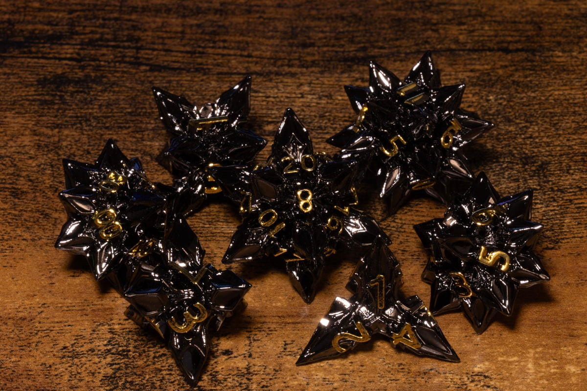Blooming Stars 7-Piece Metal Dice Set – Gunmetal with Gold Numbers