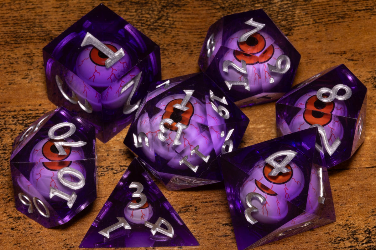 Fiend's Gaze 7-Piece Liquid Core Dice Set – Sharp Edge with Red Moving Eyes