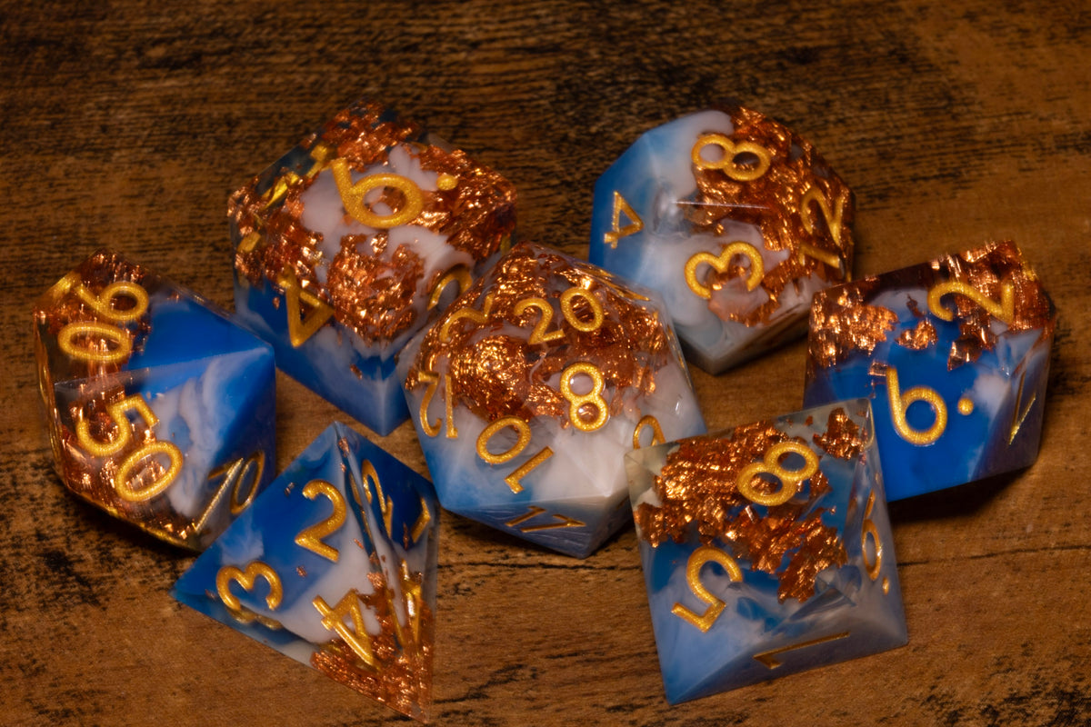 Sapphire Sky 7-Piece Sharp Edge Dice Set – Royal Blue and White with Copper Flakes