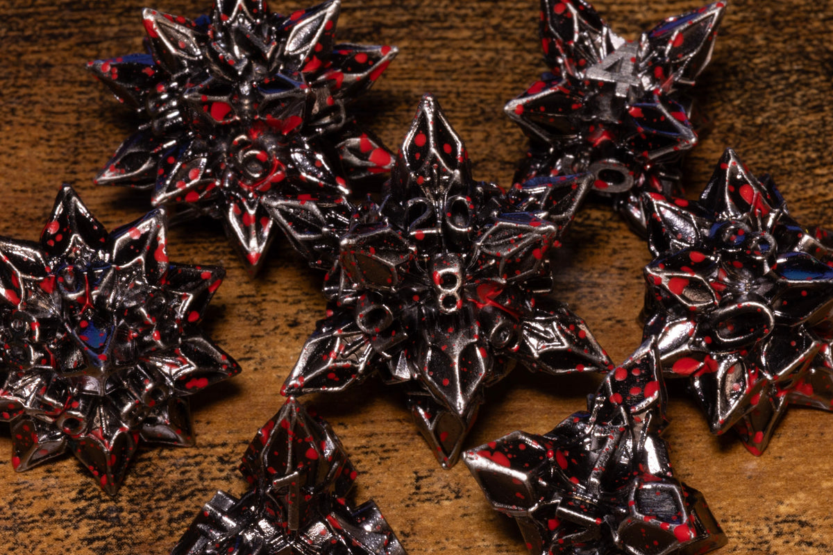 Blooming Stars 7-Piece Metal Dice Set – Antique Silver with Red Splatter
