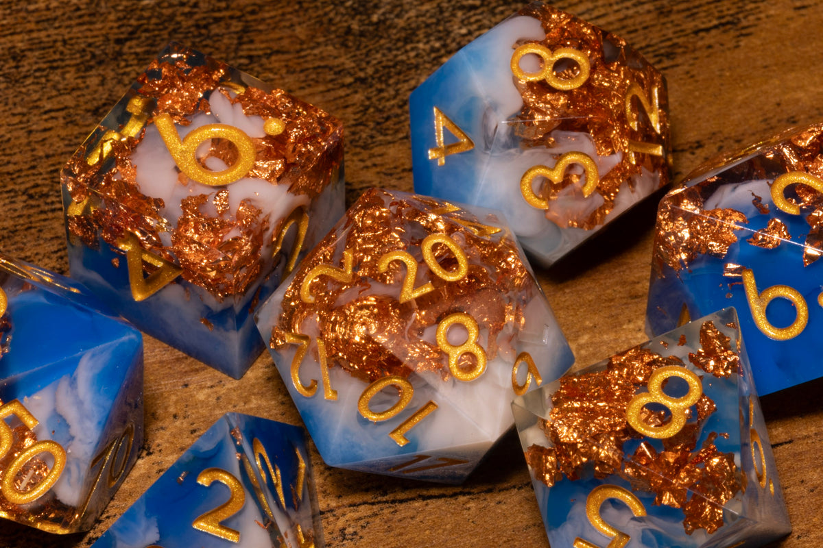 Sapphire Sky 7-Piece Sharp Edge Dice Set – Royal Blue and White with Copper Flakes