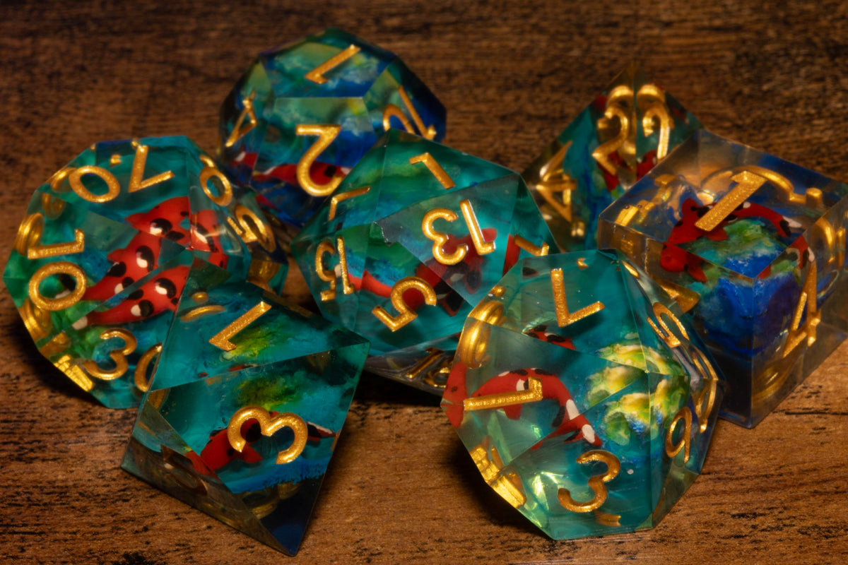 Koi Pond 7-Piece Sharp Edge Dice Set – Teal with Koi Fish Inclusions