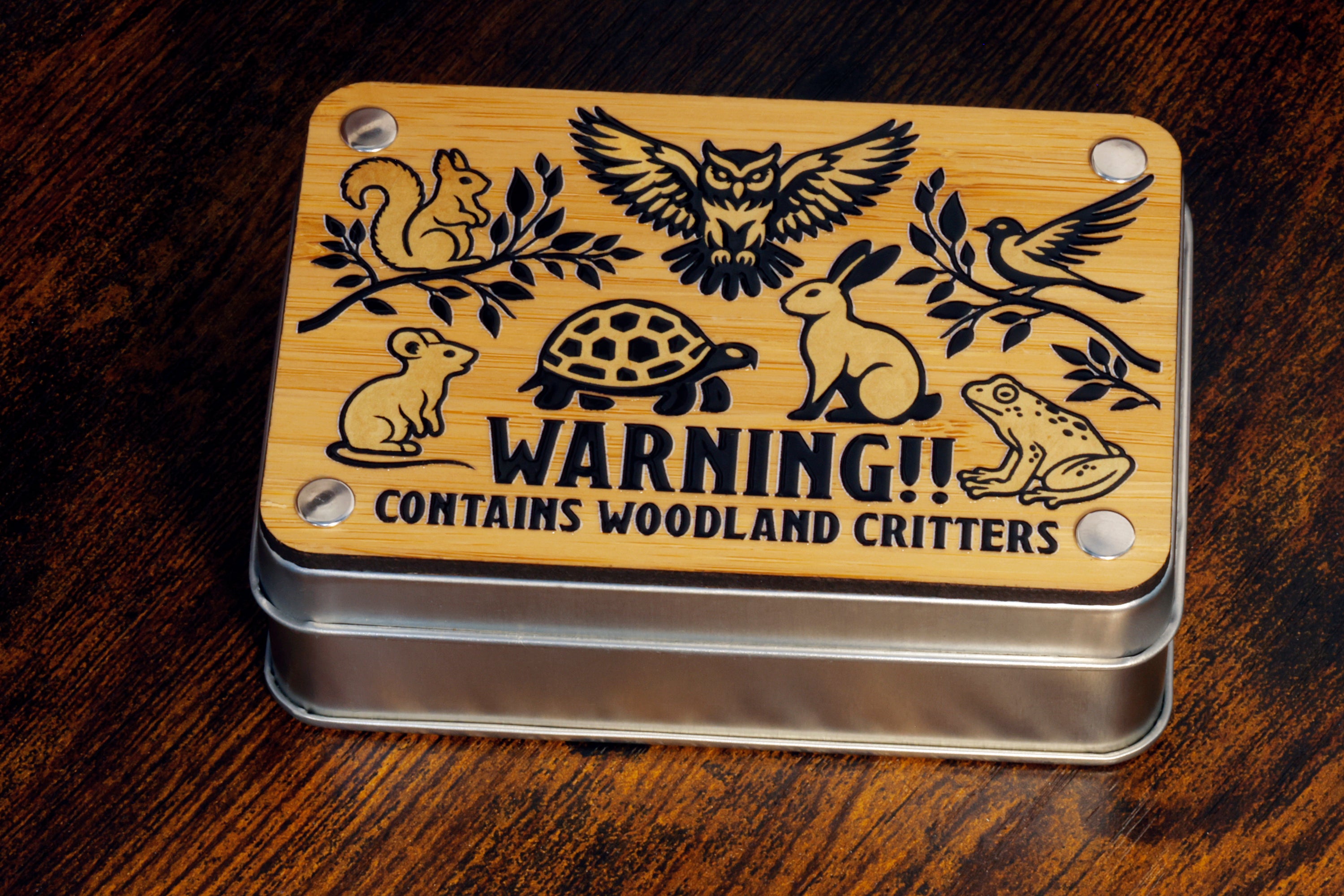 a tin with a picture of a turtle and other animals on it