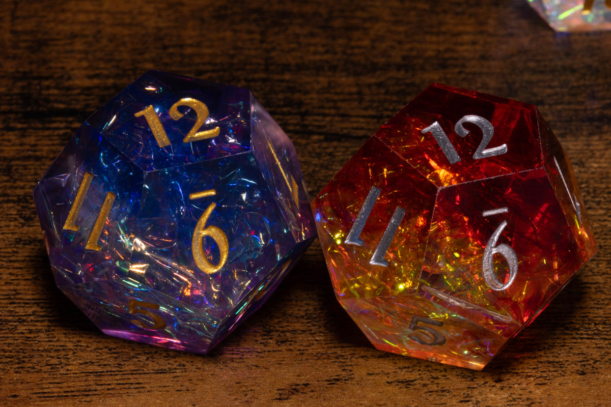 Two colorful dice with numbers on them are placed on a wooden surface.