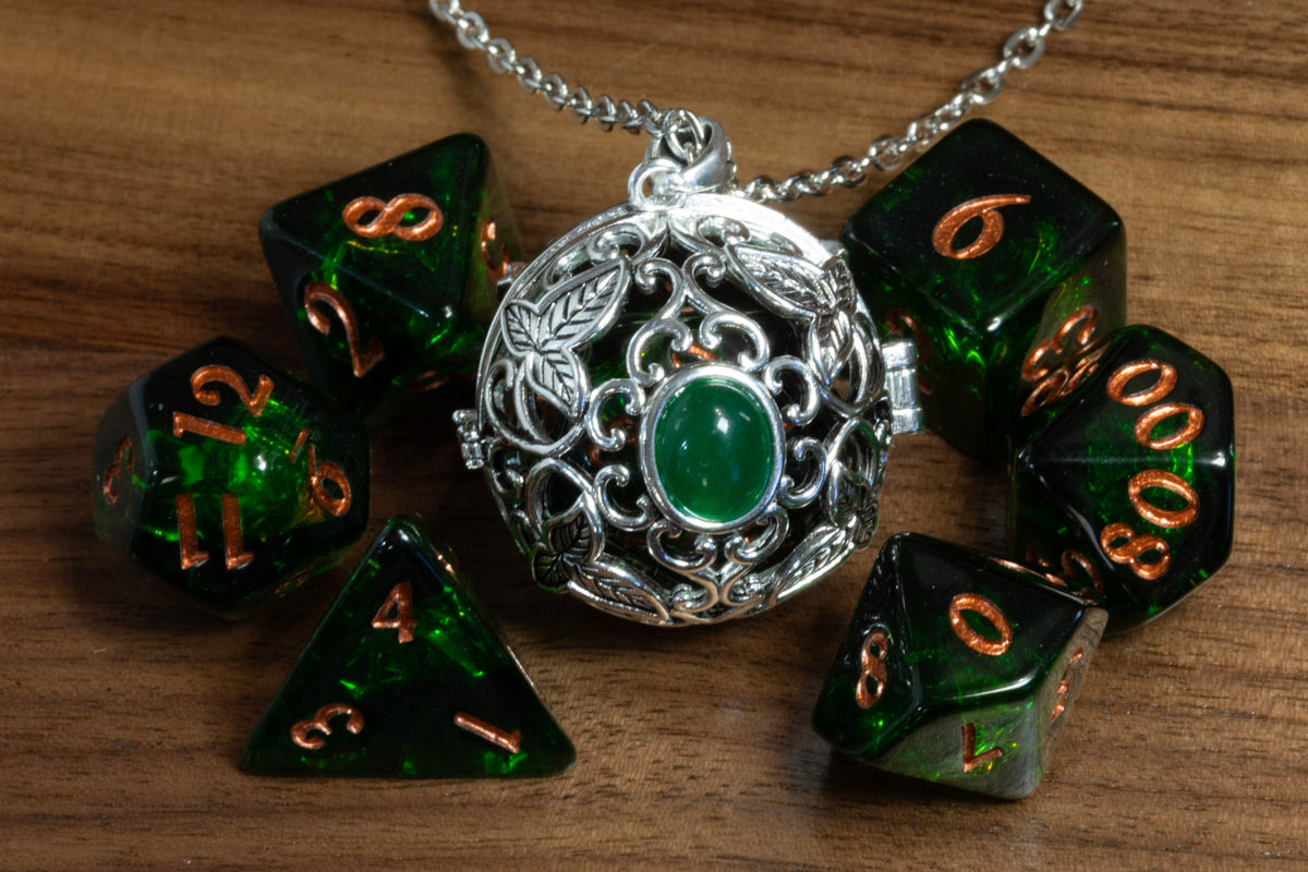 Elvish leaves pendant in a silver finish holding a D20