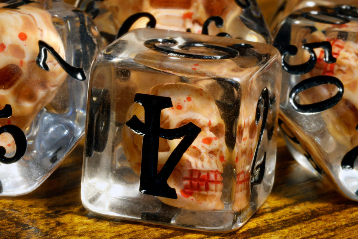 Skull 7-Piece Dice Set – Transparent with Skulls Inside, Black Font