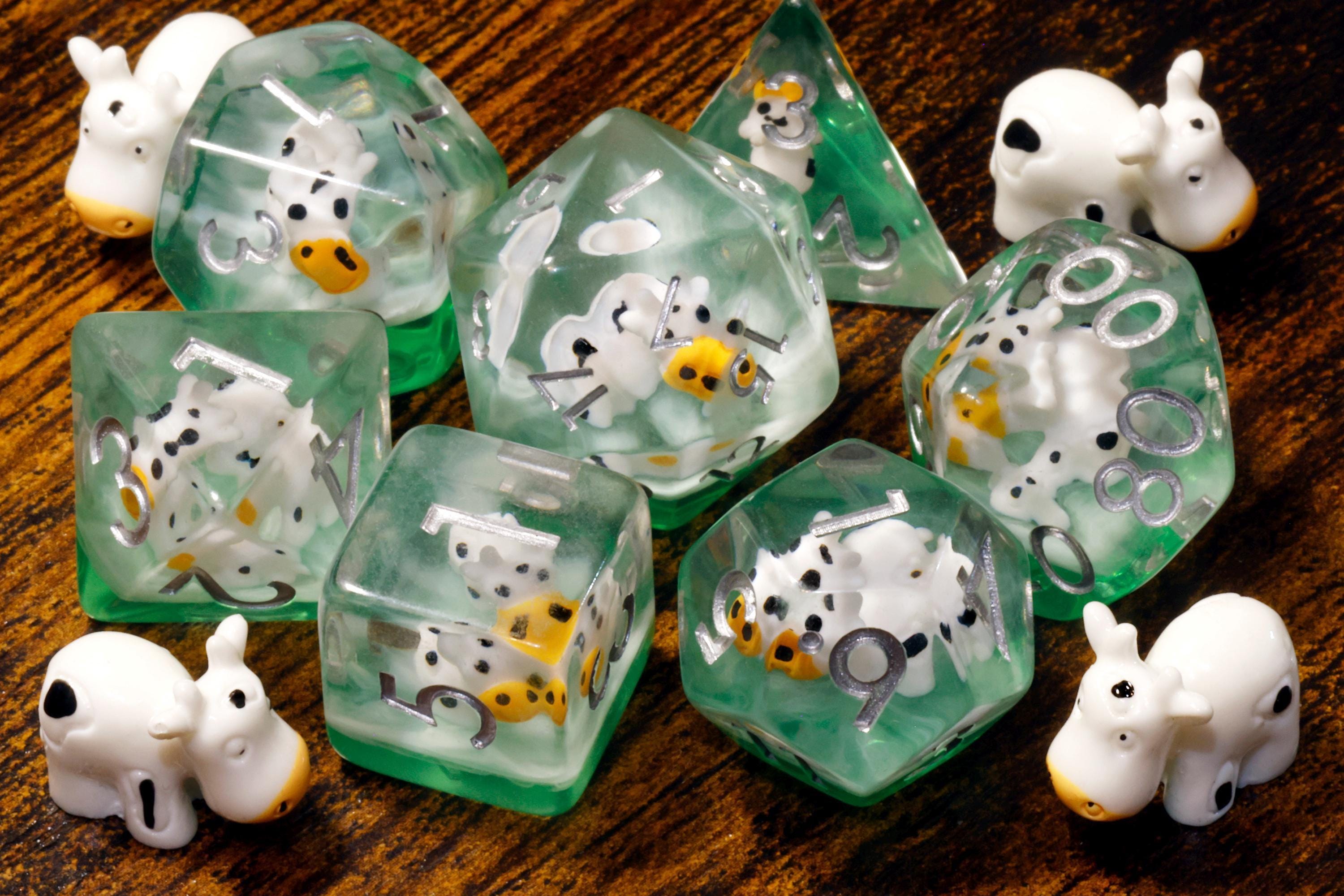 Cow resin dice set with miniature cow inclusions