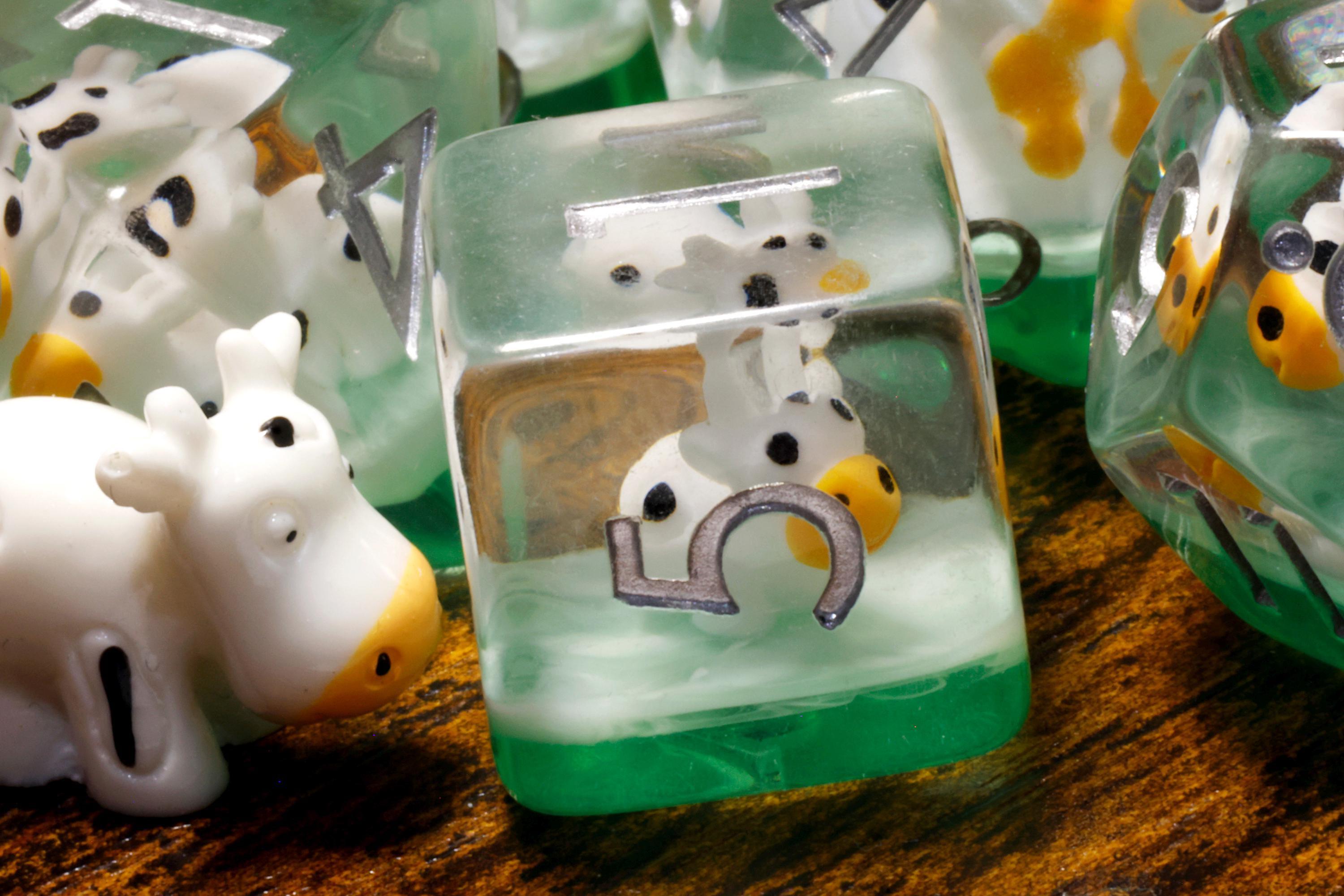 Close view of cow inclusion polyhedral dice