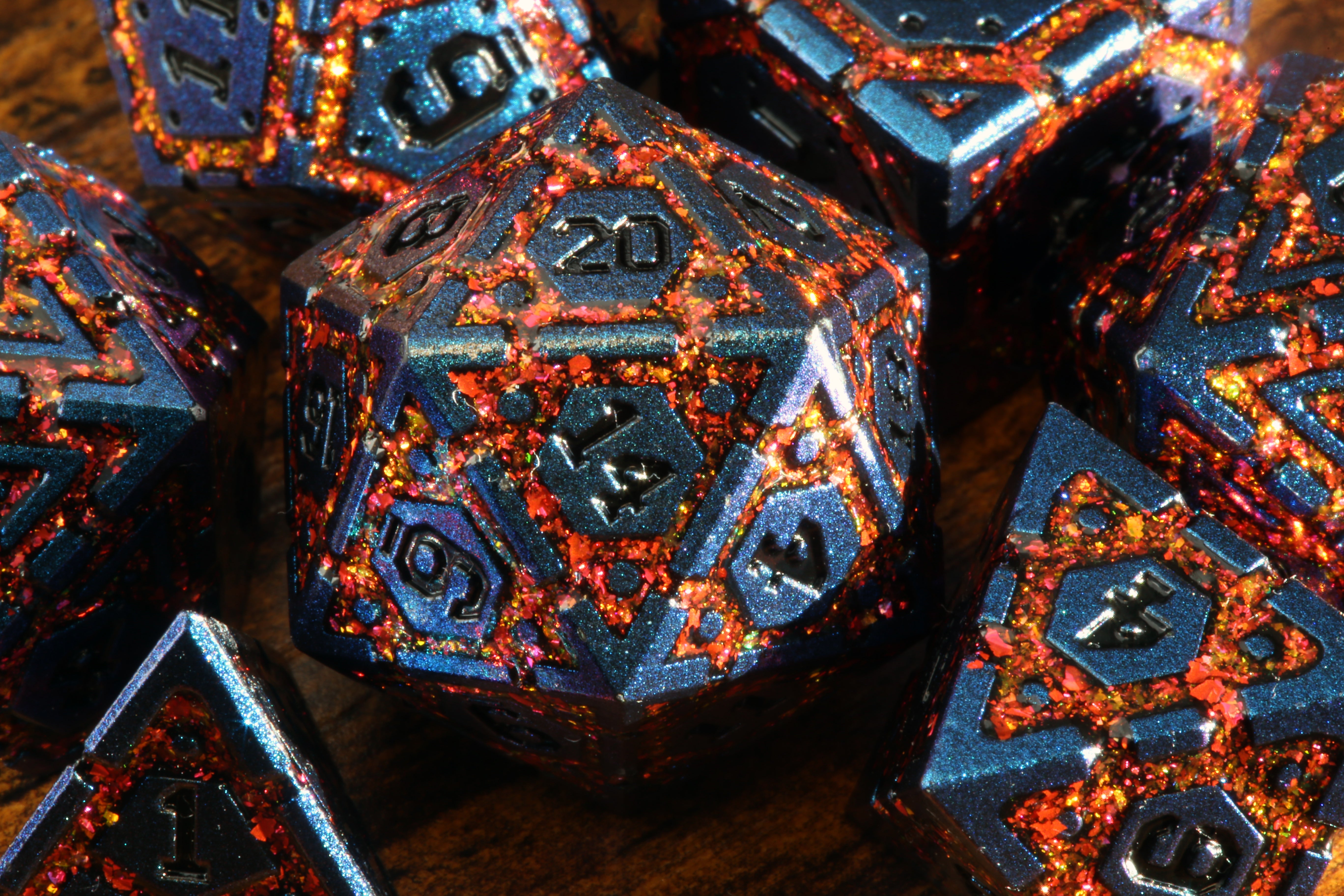 Lava Vault Dice Set - red mica with blue metal - The Wizard's Vault