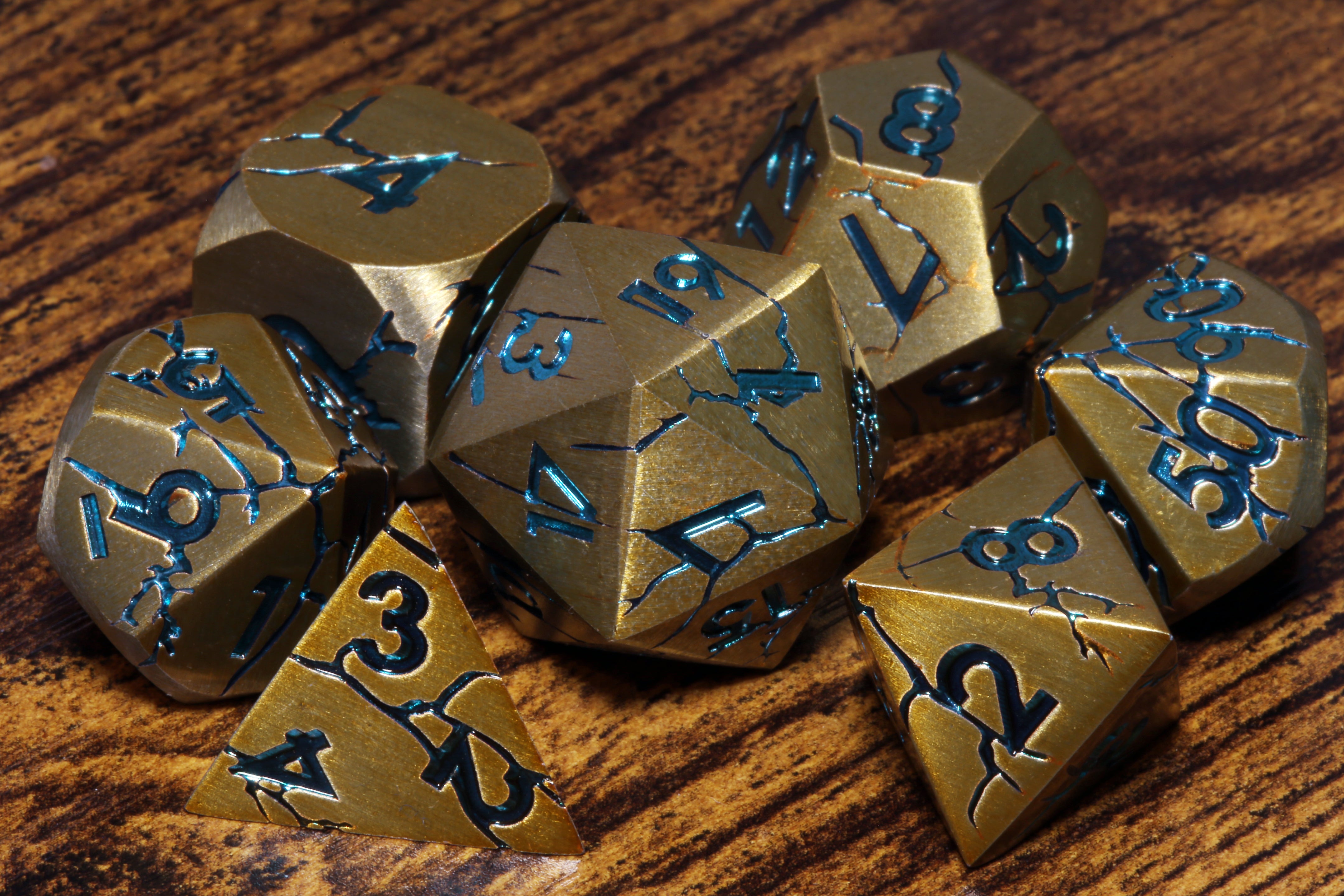 Glacial Lair - Antique gold with cracked stone effect and blue font - The Wizard's Vault