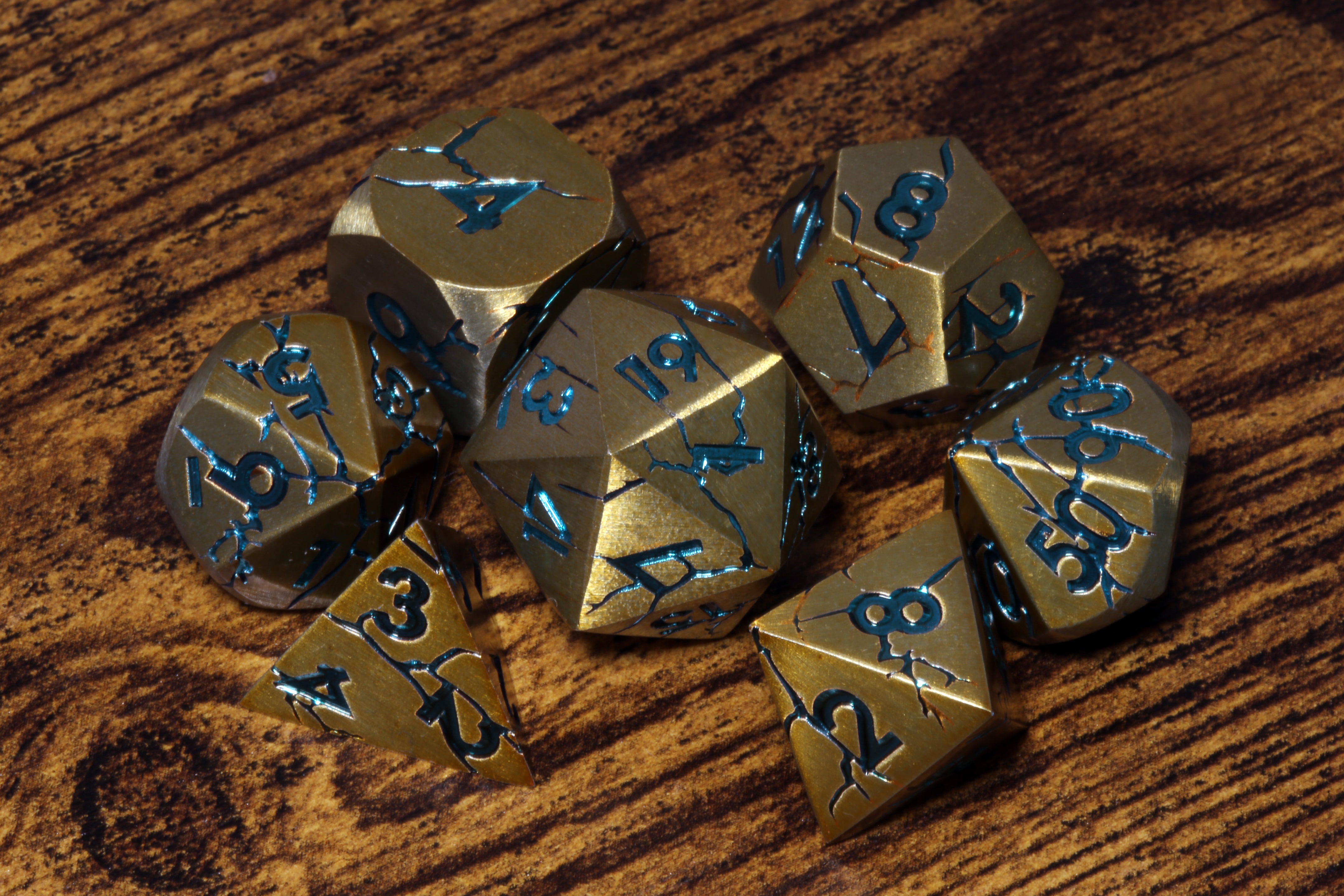 Glacial Lair - Antique gold with cracked stone effect and blue font - The Wizard's Vault