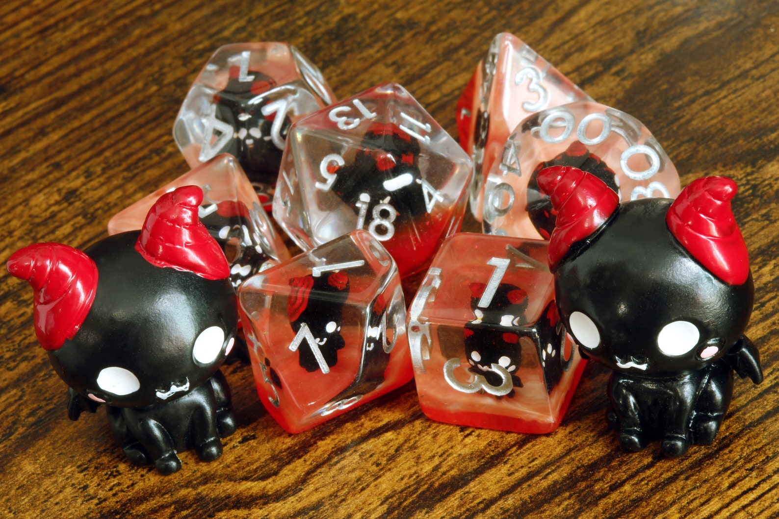 Demonic Cat dice set - Dice set with winged cats on an orange layer - The Wizard's Vault