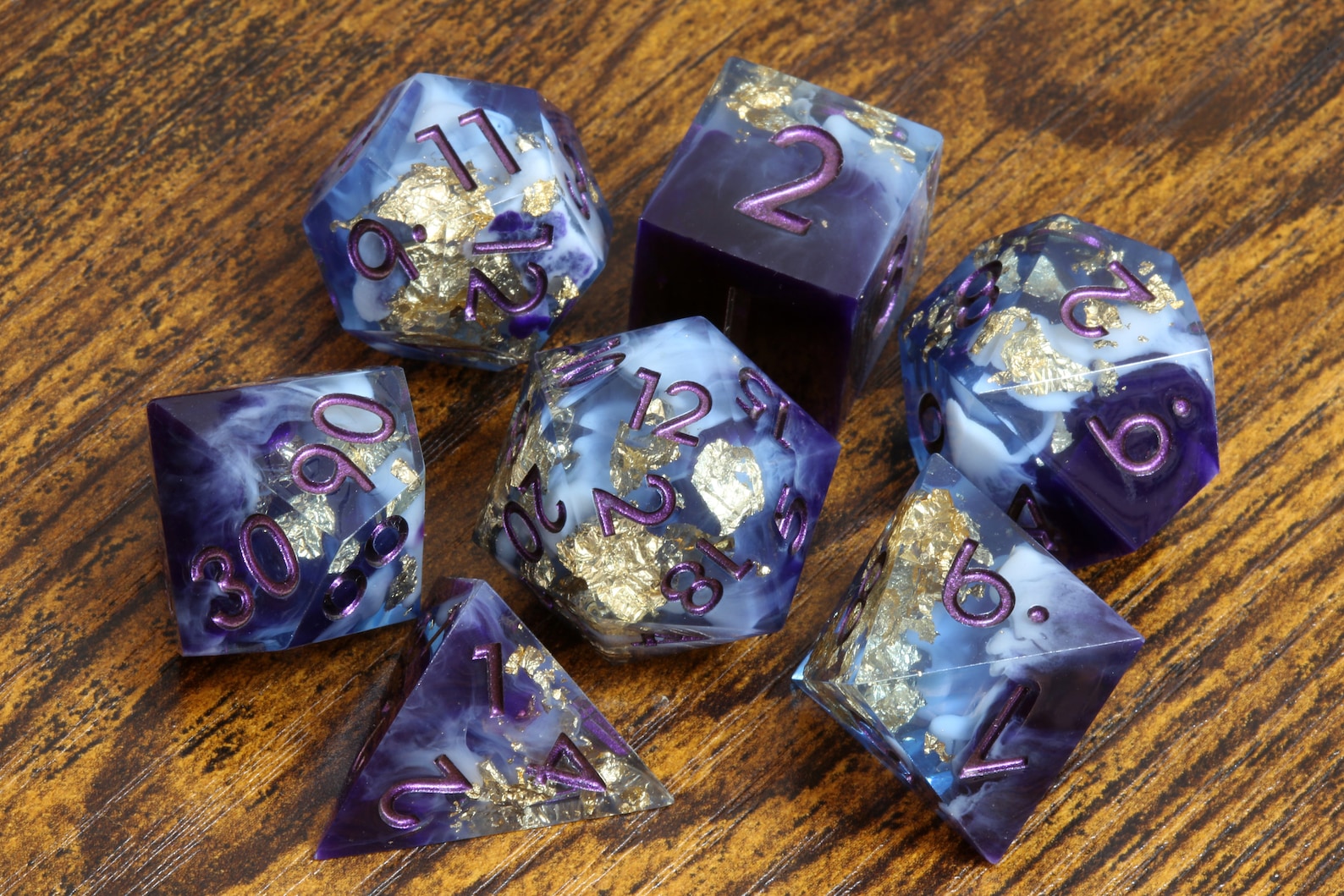 Majestic Twilight dice set - sharp edge dice set with deep purple and white resin with gold flakes - The Wizard's Vault