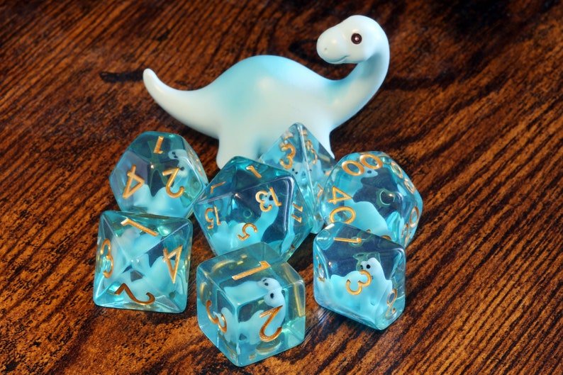 Baby diplodocus dice set, Dinosaur dice - The Wizard's Vault