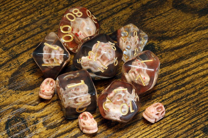 Paleontologist's Treasure dice set, Transparent with dinosaur skull - The Wizard's Vault