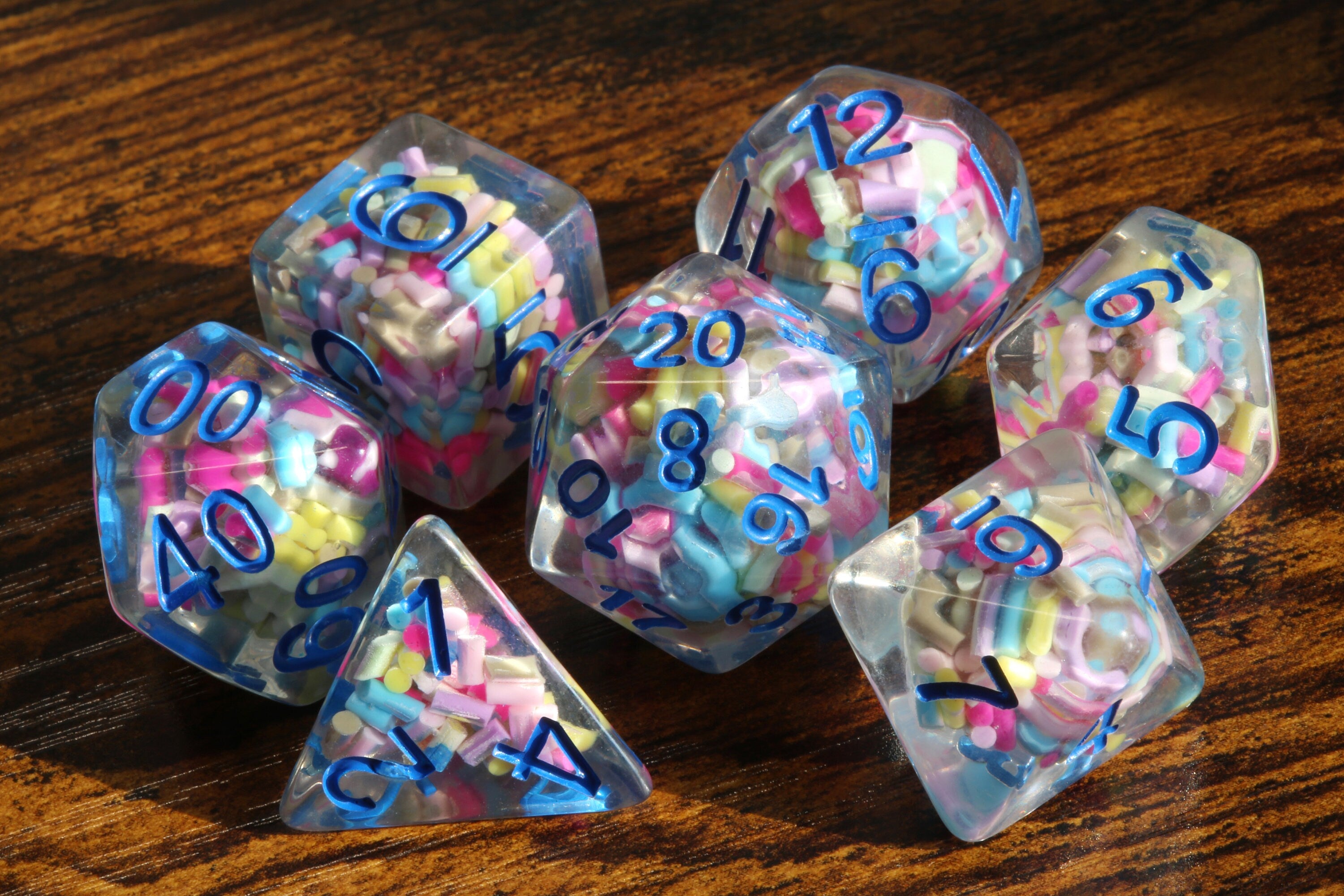 Funfetti cake dice set - Sprinkle core DND Dice, Colorful sprinkles in a clear resin & blue font, Perfect Dungeon Master Birthday Gift - The Wizard's Vault