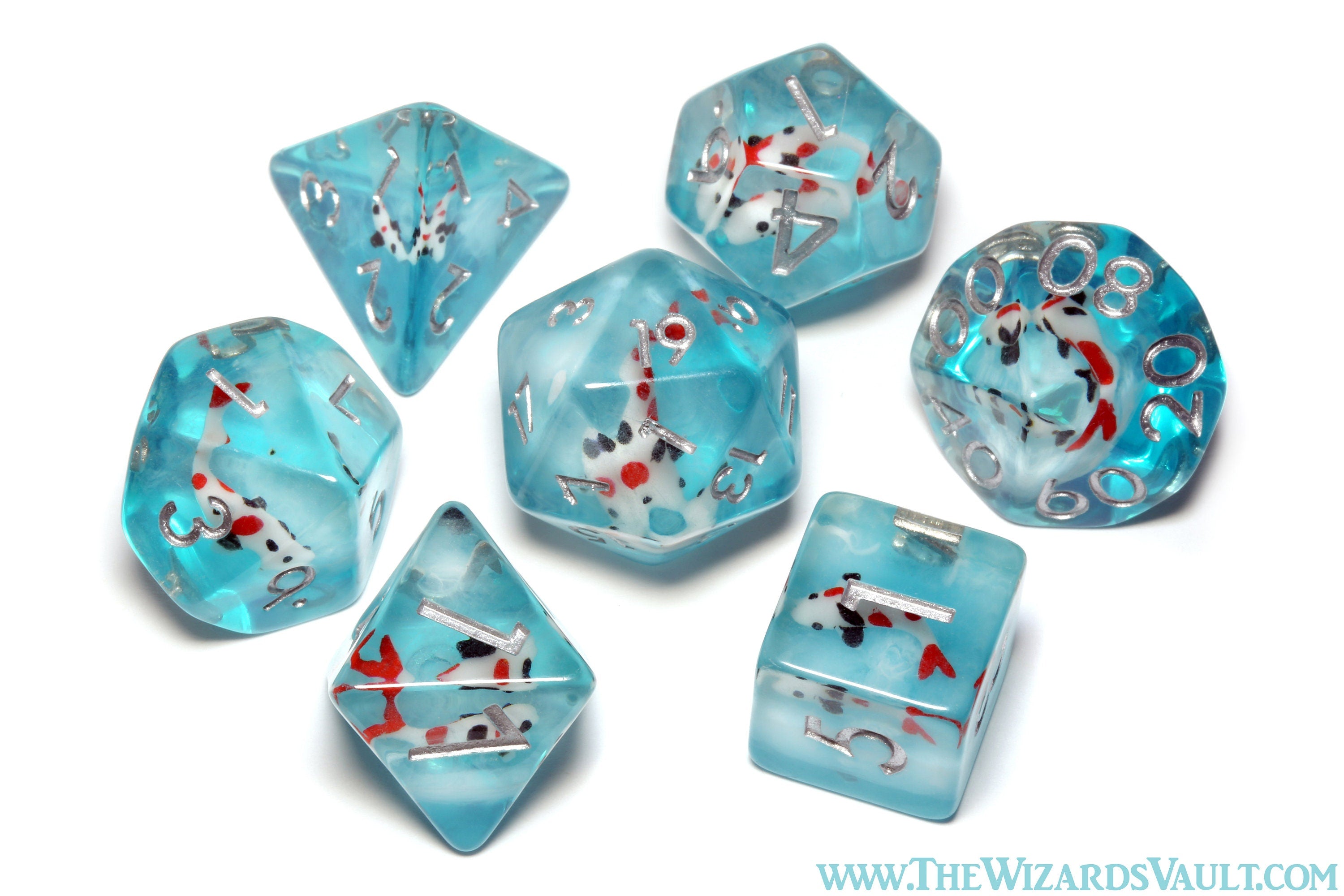 Ocean Koi dice set - DND Dice set with small fish on a blue layer - The Wizard's Vault