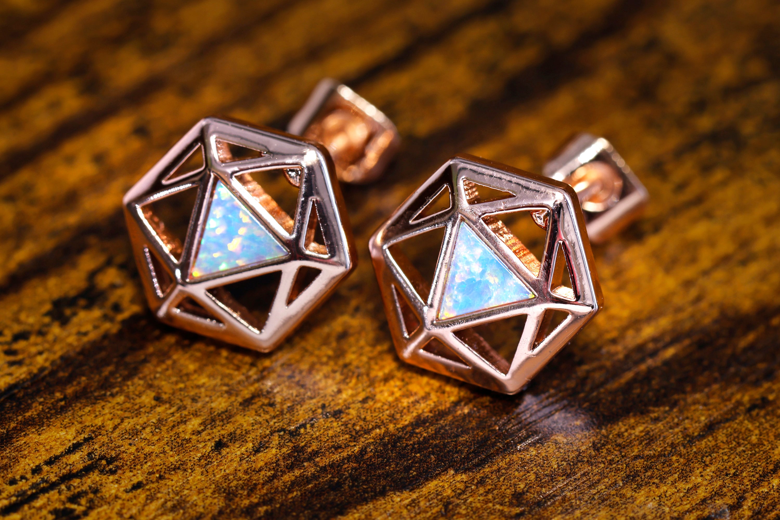 D20 Dice stud earrings, Rose gold dice earrings with light blue opal - The Wizard's Vault