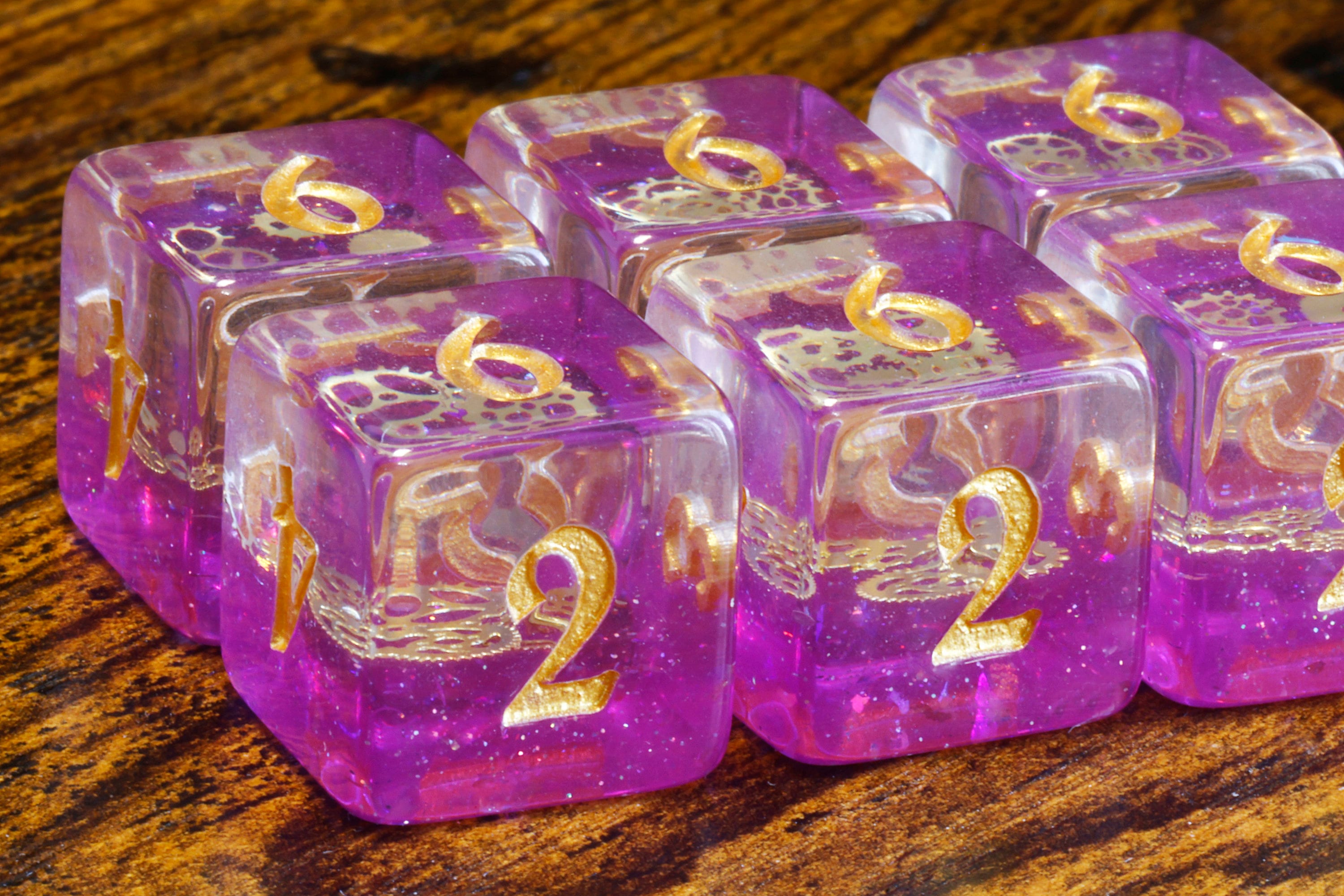 Arcane Sprockets D6 Dice, Purple glittery layer with small golden gear