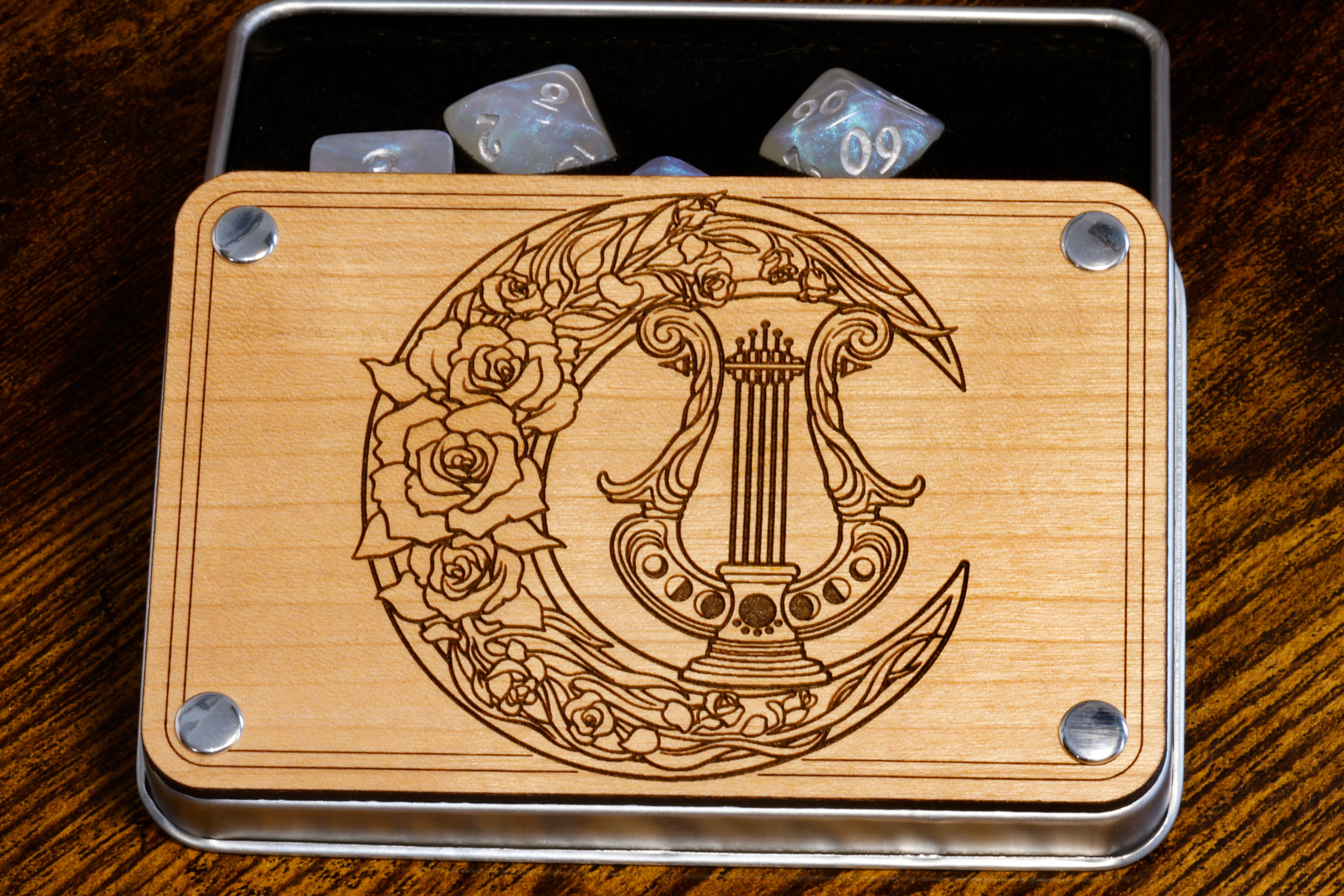 Bard symbol engraved box and Divine Radiance dice set - The Wizard's Vault