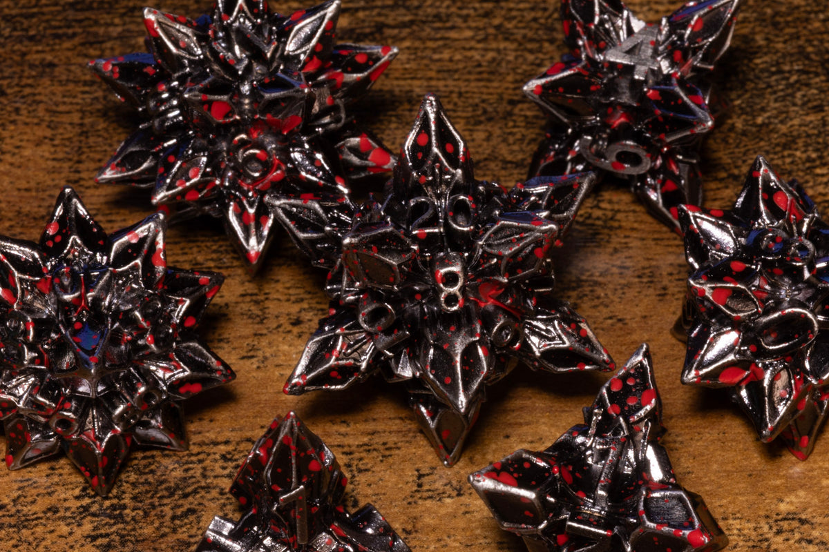 Blooming Stars 7-Piece Metal Dice Set – Antique Silver with Red Splatter