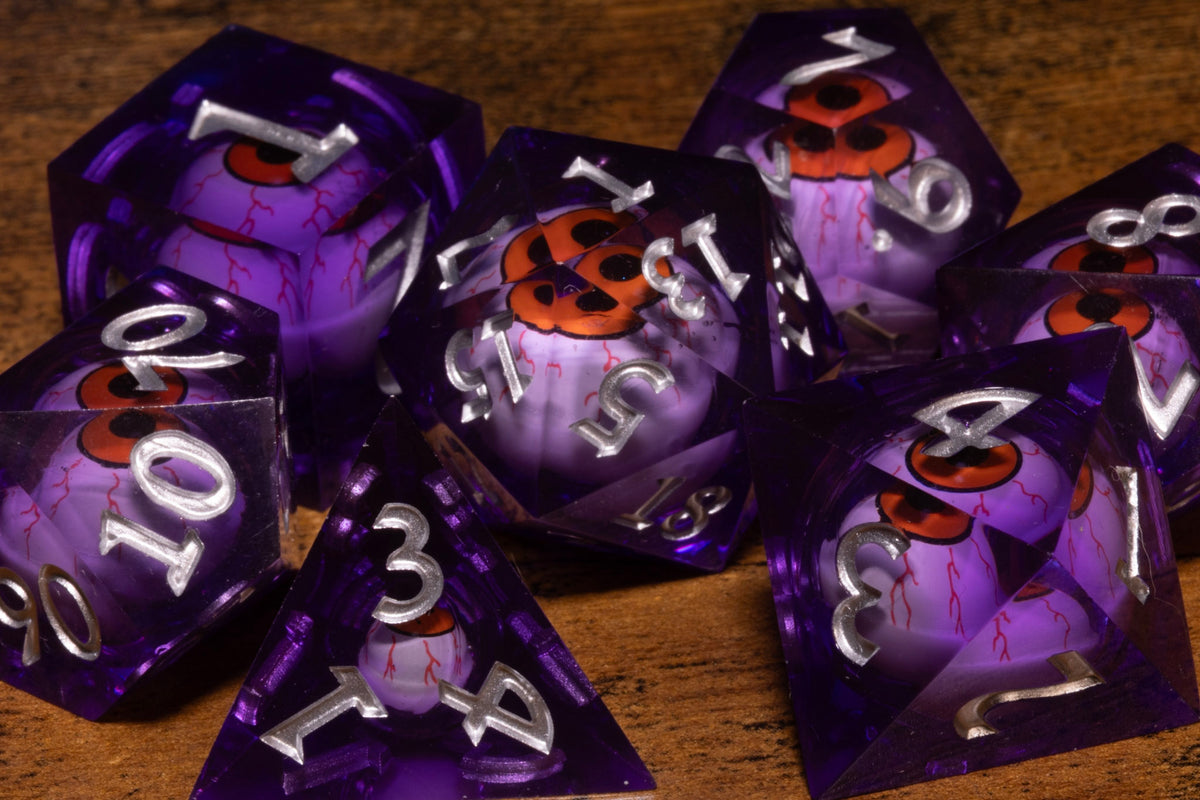 Fiend's Gaze 7-Piece Liquid Core Dice Set – Sharp Edge with Red Moving Eyes