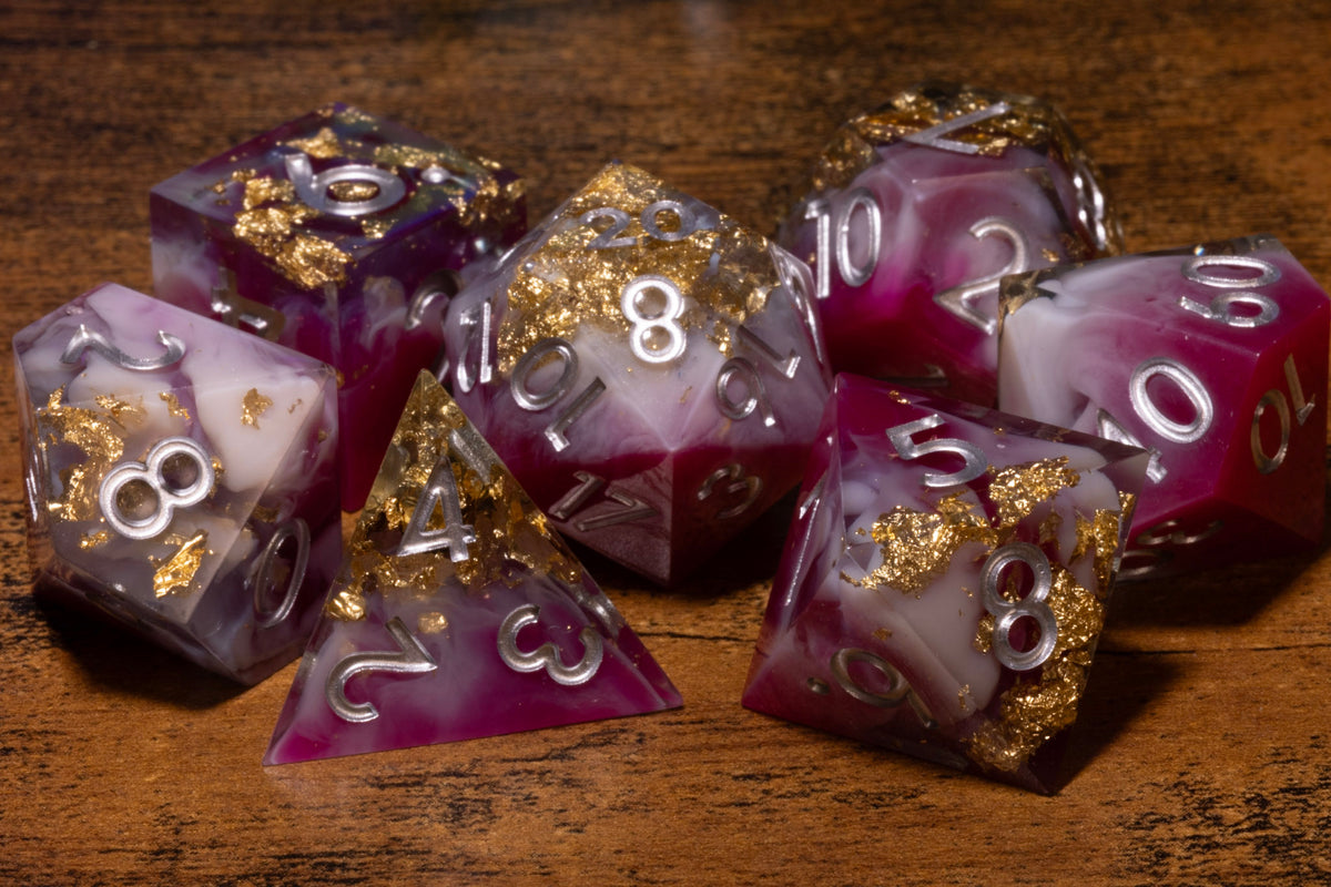 Royal Orchid 7-Piece Sharp Edge Dice Set – Magenta and White with Gold Flakes