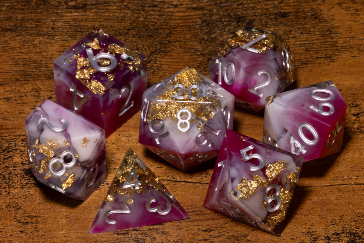 Royal Orchid 7-Piece Sharp Edge Dice Set – Magenta and White with Gold Flakes
