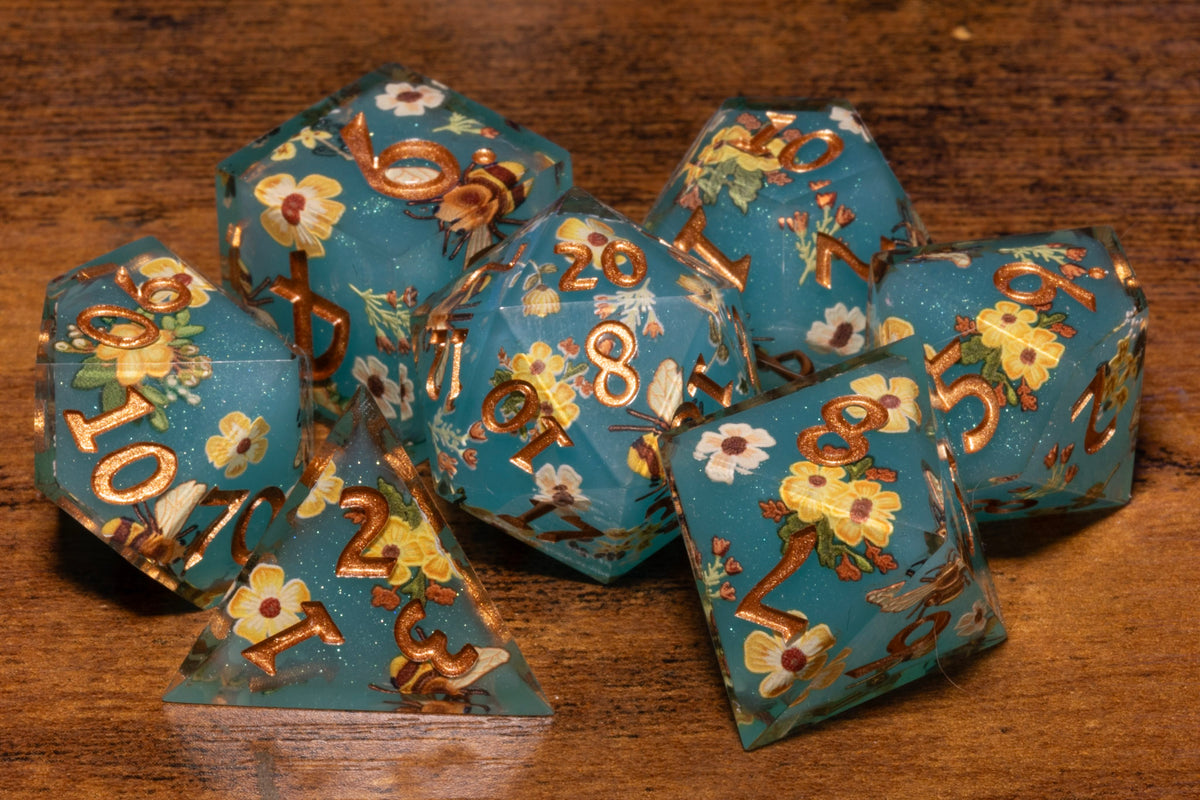 Honey Meadow 7-Piece Sharp Edge Dice Set – Teal with Bee & Wildflower Pattern