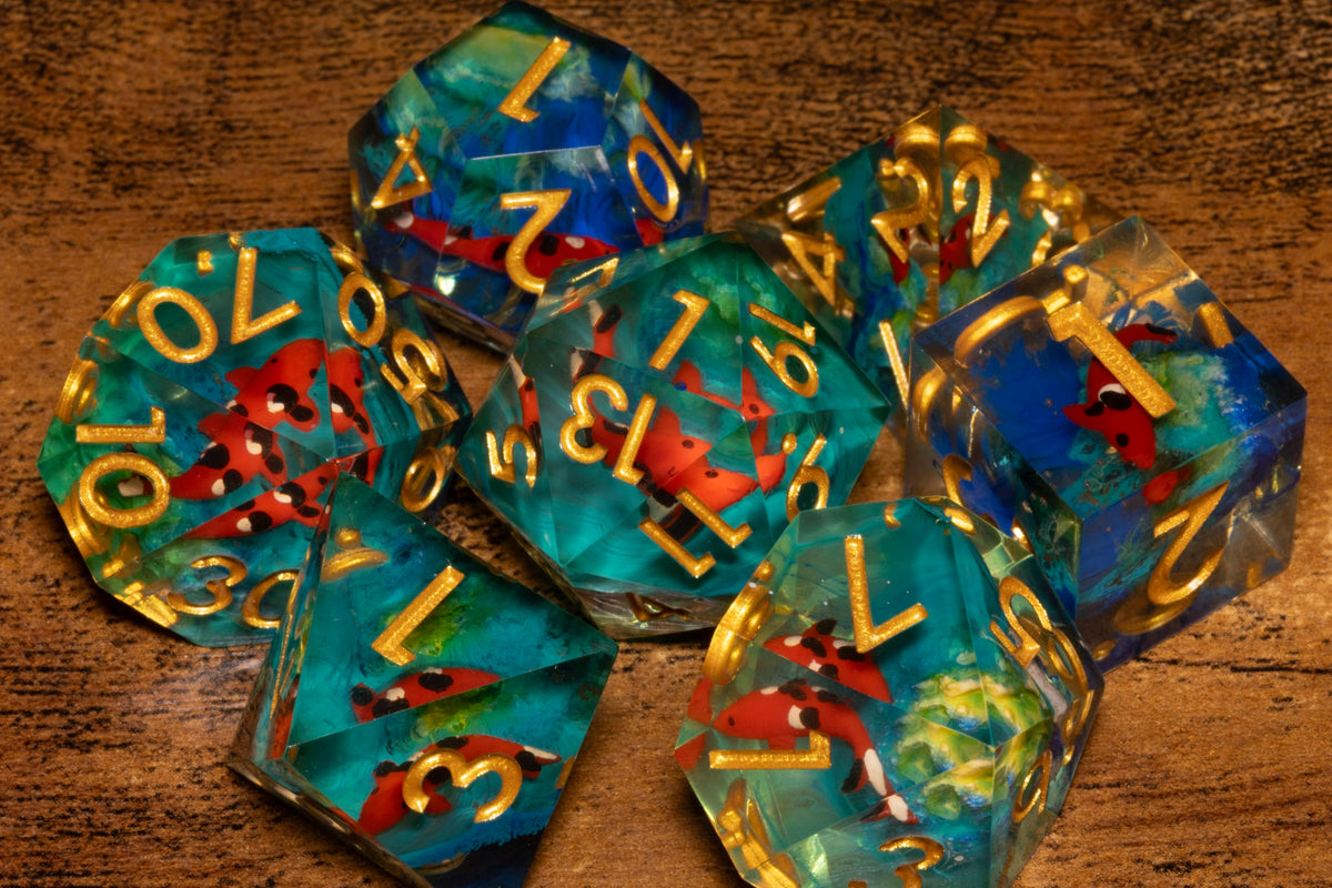 Koi Pond 7-Piece Sharp Edge Dice Set – Teal with Koi Fish Inclusions