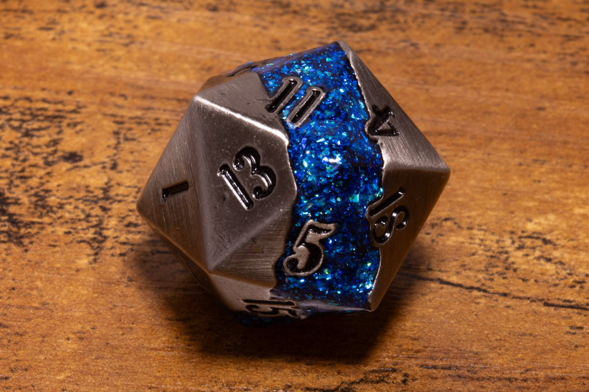 Mana Ore Metal D20 – Antique Silver with Blue Mica