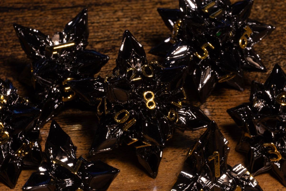 Blooming Stars 7-Piece Metal Dice Set – Gunmetal with Gold Numbers