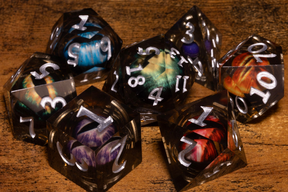 Council of Wyrms 7-Piece Liquid Core Dice Set – Sharp Edge with Mixed Dragon Eyes