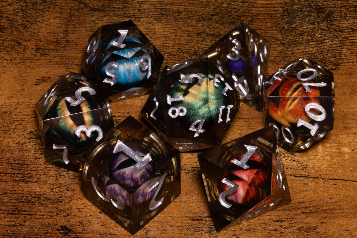 Council of Wyrms 7-Piece Liquid Core Dice Set – Sharp Edge with Mixed Dragon Eyes
