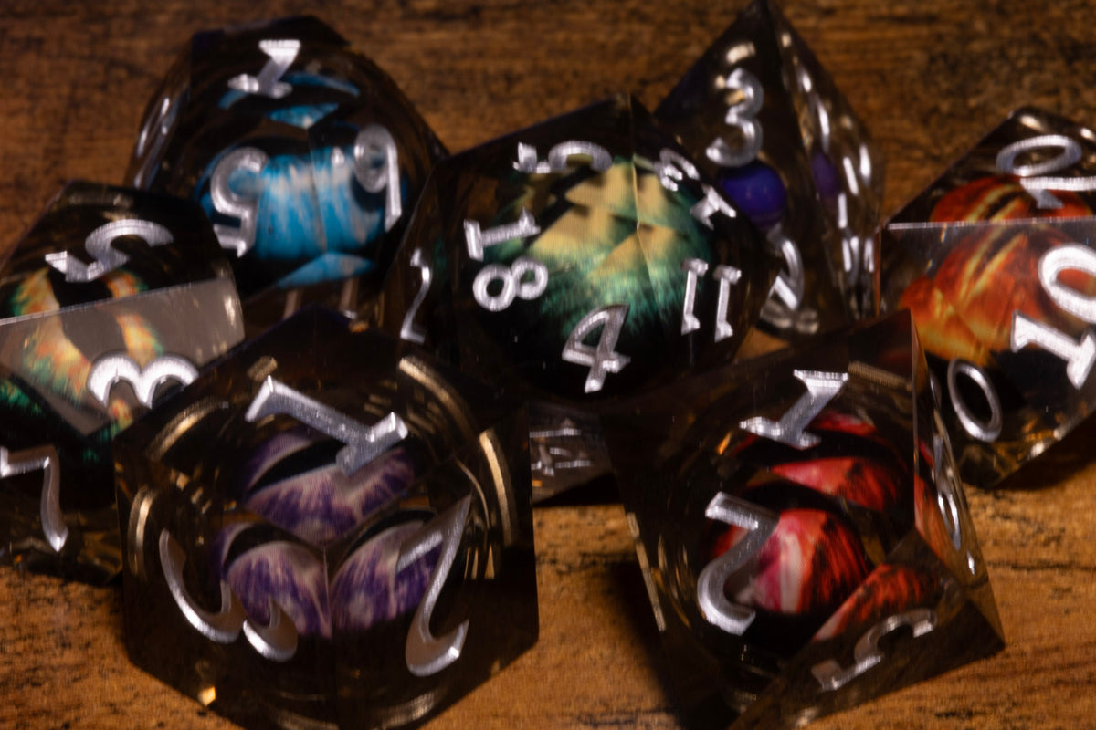 Council of Wyrms 7-Piece Liquid Core Dice Set – Sharp Edge with Mixed Dragon Eyes