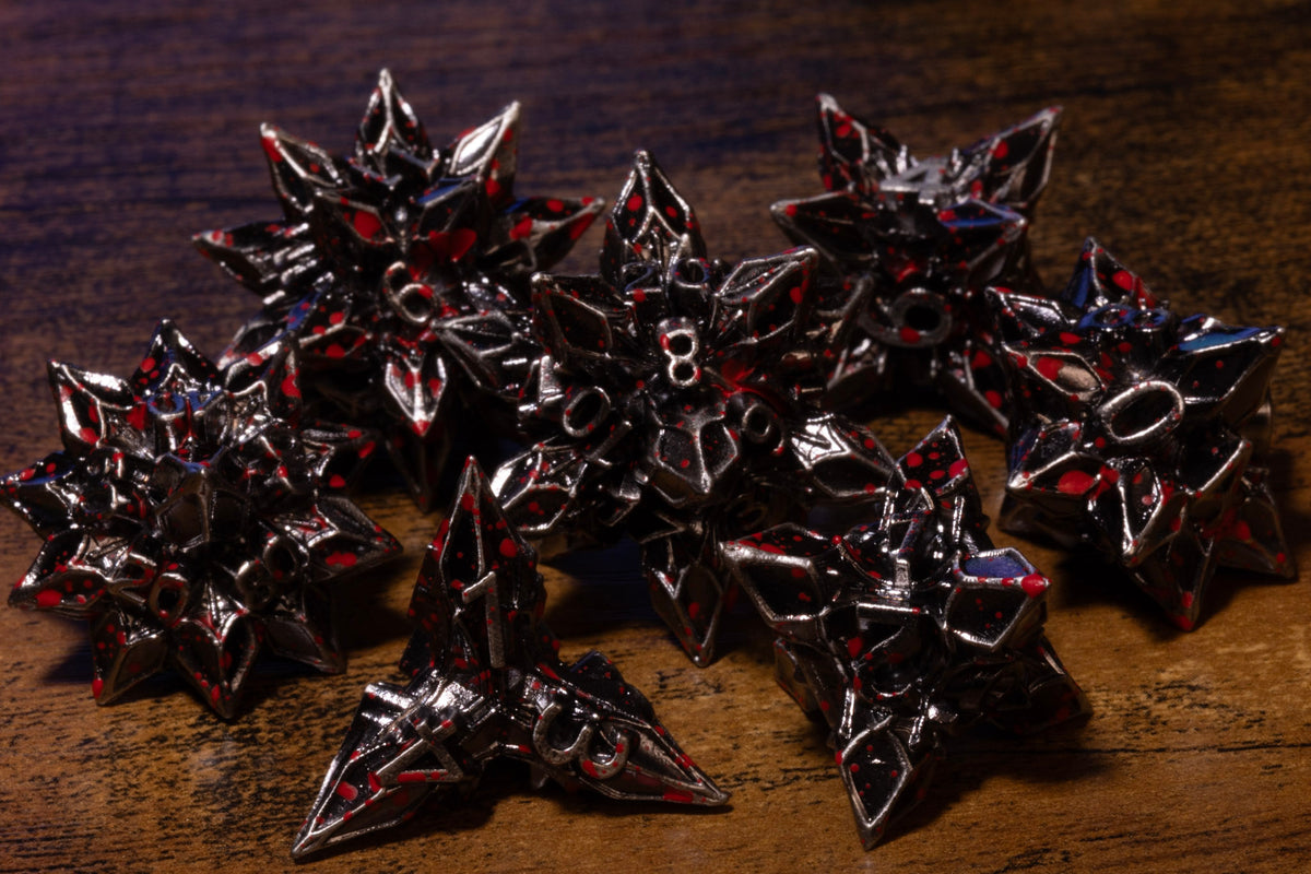 Blooming Stars 7-Piece Metal Dice Set – Antique Silver with Red Splatter