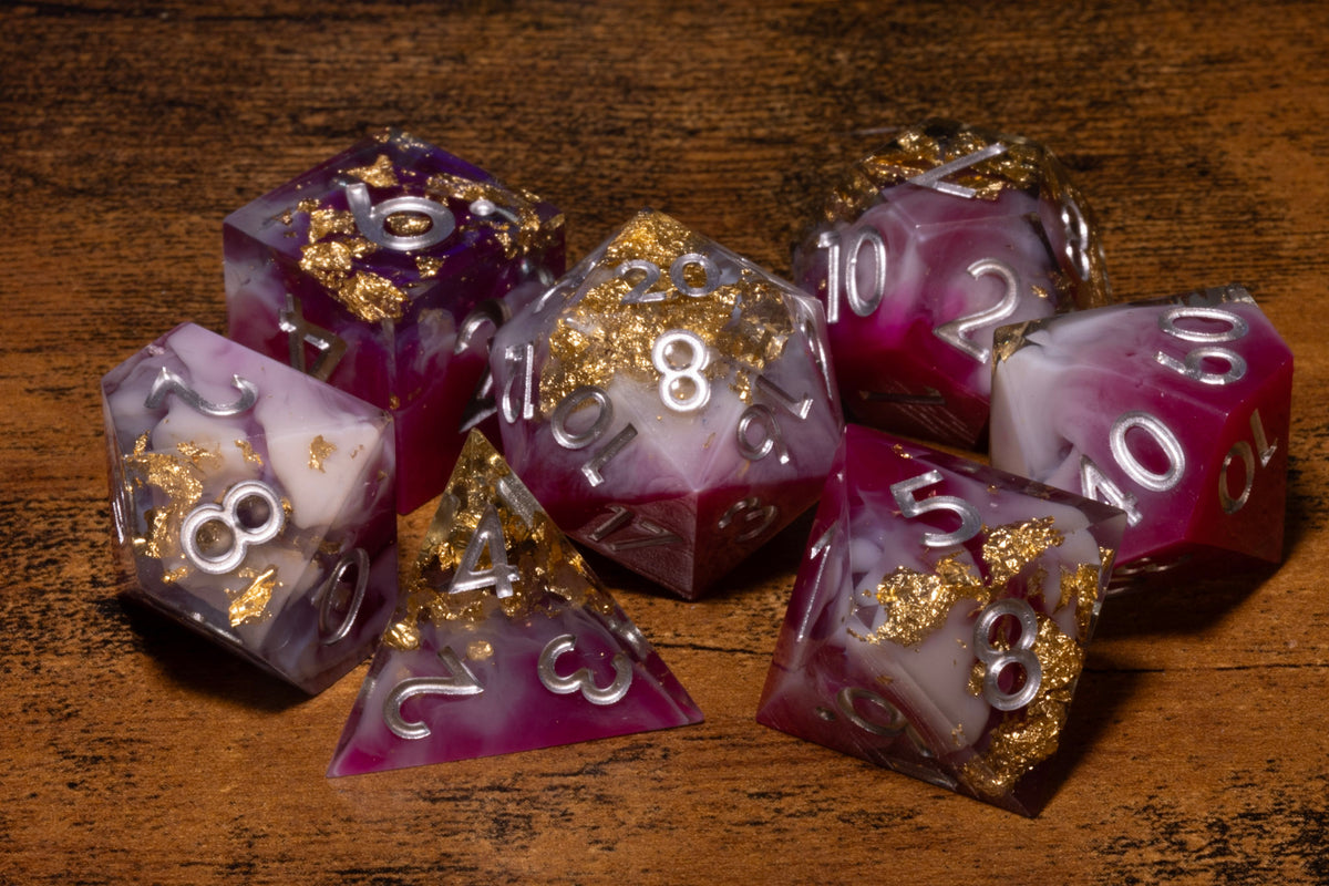 Royal Orchid 7-Piece Sharp Edge Dice Set – Magenta and White with Gold Flakes