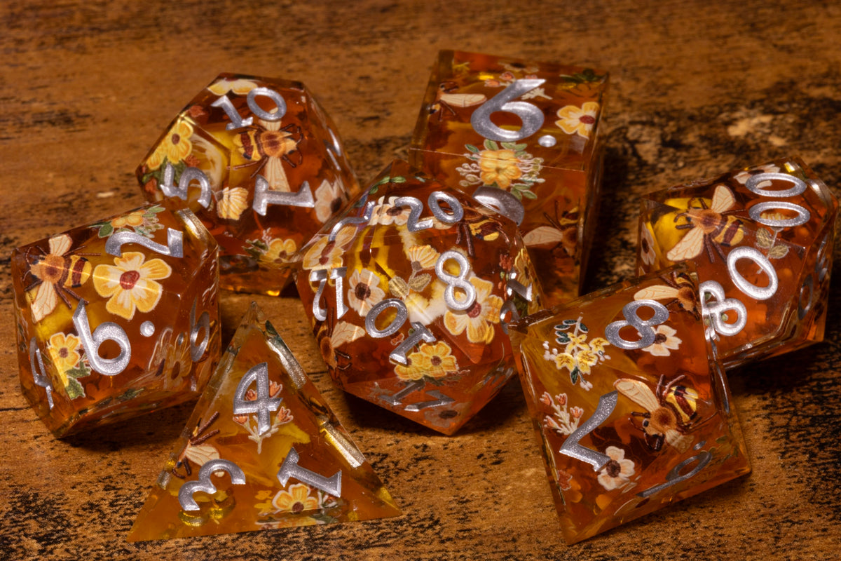 Honey Meadow 7-Piece Sharp Edge Dice Set – Amber with Bee & Wildflower Pattern