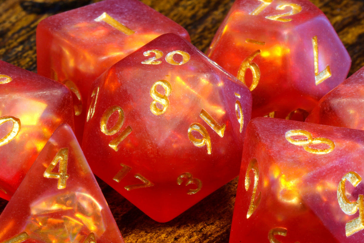 Dragon's Breath dice set, red-orange frosted resin with holographic inclusions