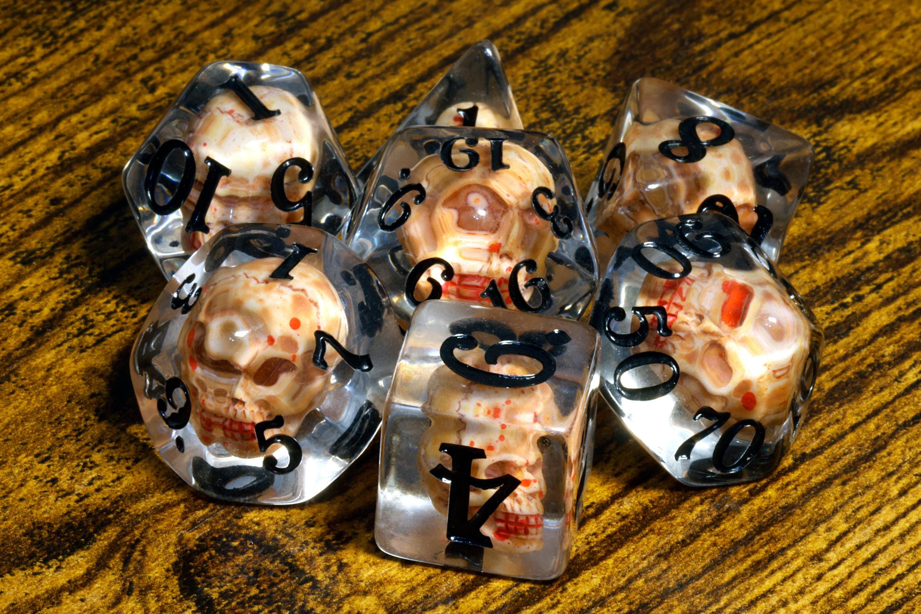 Skull 7-Piece Dice Set – Transparent with Skulls Inside, Black Font