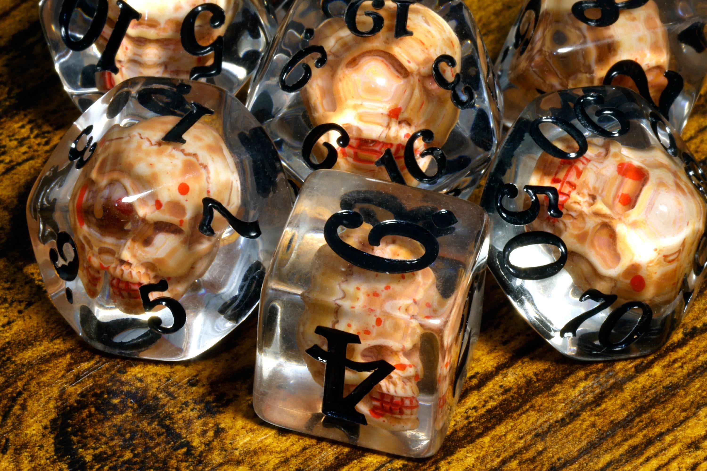 Skull 7-Piece Dice Set – Transparent with Skulls Inside, Black Font