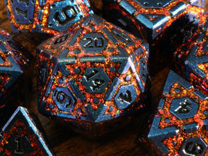 Lava Vault Dice Set - red mica with blue metal - The Wizard's Vault