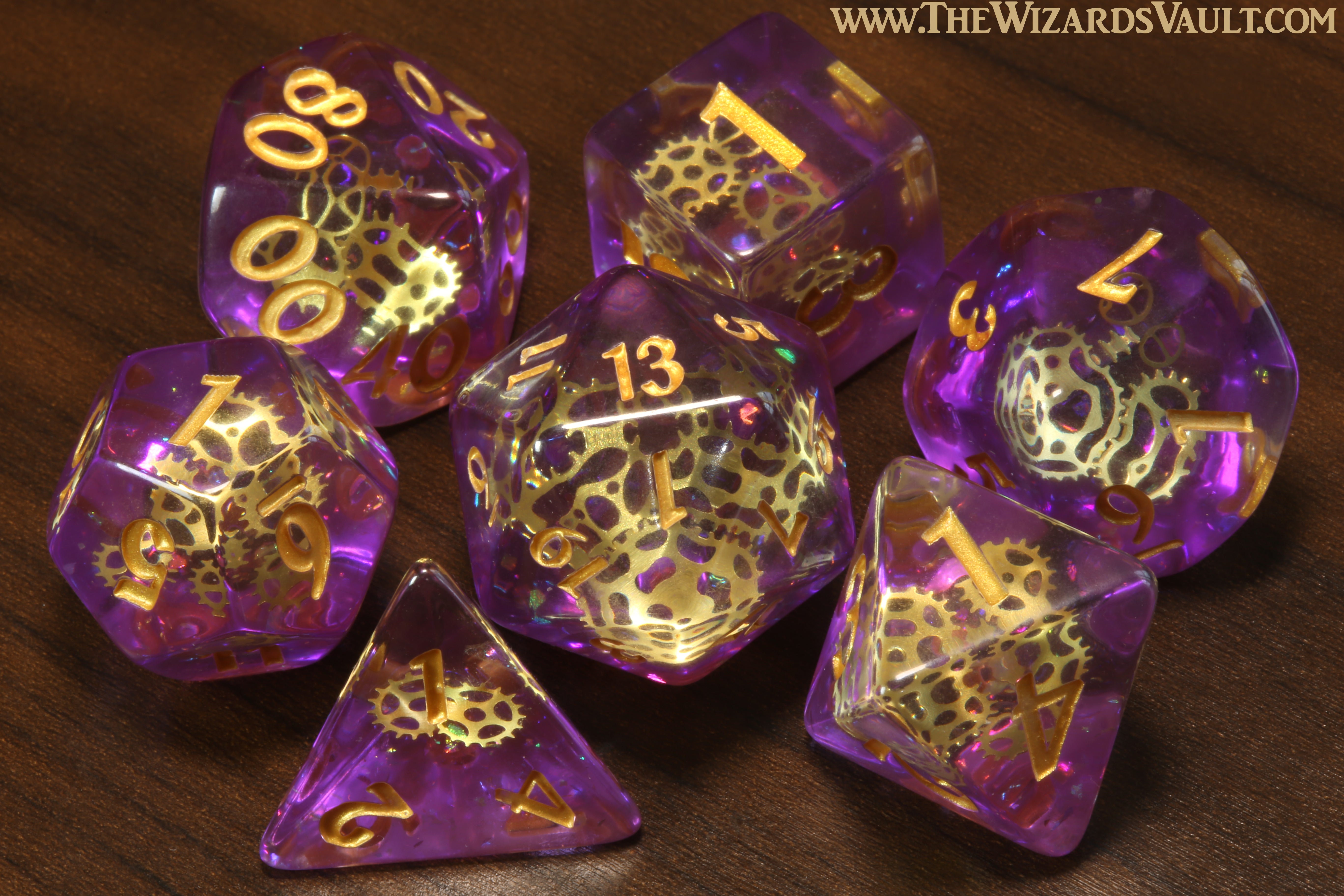 Arcane Sprockets - Dice with tiny golden gears on a purple glittery layer. - The Wizard's Vault