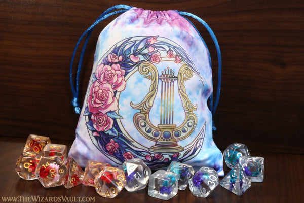 Bard inspired dice bag and Sprite Bloom dice sets with flowers - The Wizard's Vault