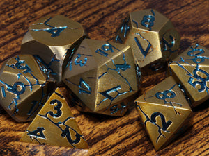 Glacial Lair - Antique gold with cracked stone effect and blue font - The Wizard's Vault