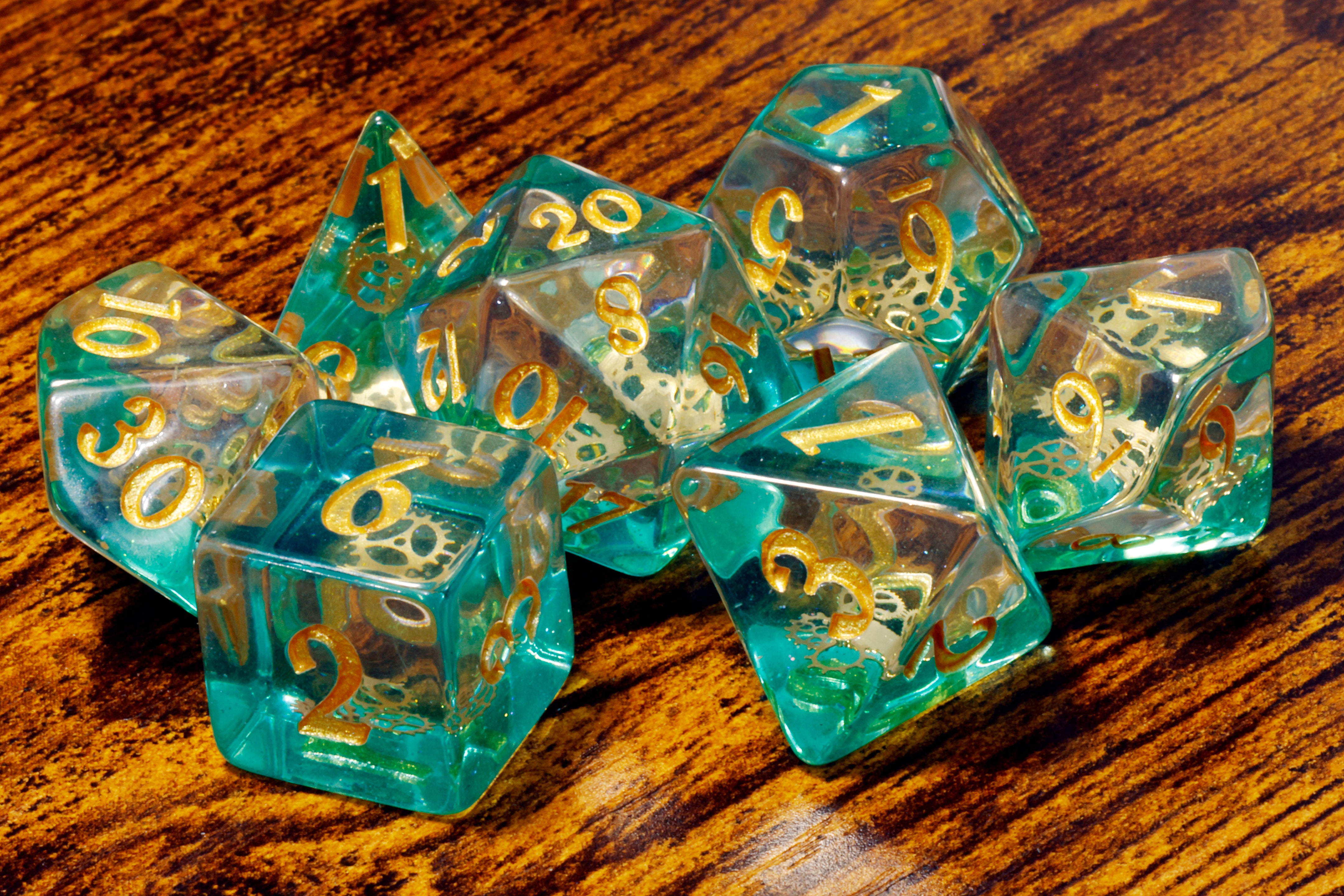 a group of dice sitting on top of a wooden table